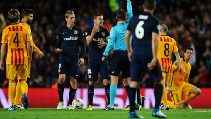 BARCELONA, SPAIN – APRIL 05: Fernando Torres of Atletico Madrid (9) is shown a red card by referee Felix Brych and is sent off during the UEFA Champions League quarter final first leg match between FC Barcelona and Club Atletico de Madrid at Camp Nou on April 5, 2016 in Barcelona, Spain. (Photo by David Ramos/Getty Images)