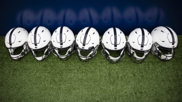 STATE COLLEGE, PA - NOVEMBER 20: A general view of Penn State Nittany Lions helmets on the sidelines during the second half of the game between the Penn State Nittany Lions and the Rutgers Scarlet Knights at Beaver Stadium on November 20, 2021 in State College, Pennsylvania. (Photo by Scott Taetsch/Getty Images)