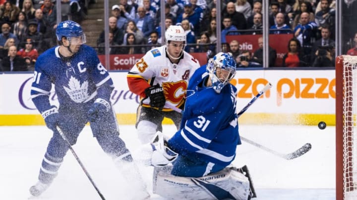 TORONTO, ON - JANUARY 16: Frederik Andersen #31 of the Toronto Maple Leafs watches as the puck goes wide of the net against the Calgary Flames in overtime at the Scotiabank Arena on January 16, 2020 in Toronto, Ontario, Canada. (Photo by Kevin Sousa/NHLI via Getty Images)