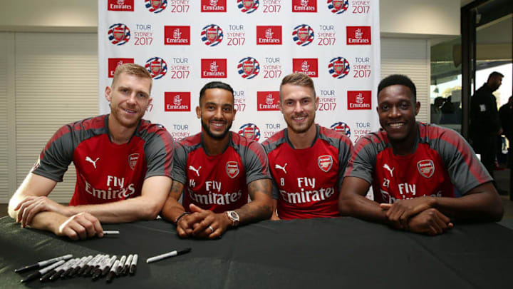 SYDNEY, AUSTRALIA - JULY 12: Arsenal players Per Mertesacker, Aaron Ramsey, Theo Walcott and Dany Welbeck pose during the Emirates Kids Clinic with Arsenal FC at Sydney University on July 12, 2017 in Sydney, Australia. (Photo by Mark Metcalfe/Getty Images for Emirates)