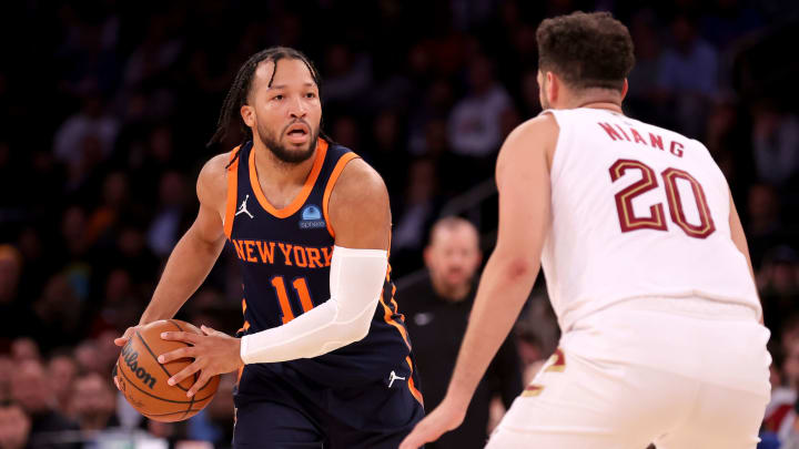 Nov 1, 2023; New York, New York, USA; New York Knicks guard Jalen Brunson (11) controls the ball against Cleveland Cavaliers forward Georges Niang (20) during the fourth quarter at Madison Square Garden. Mandatory Credit: Brad Penner-USA TODAY Sports