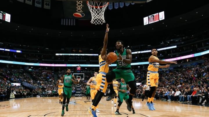 Feb 21, 2016; Denver, CO, USA; Boston Celtics forward Jae Crowder (99) drives to the net against Denver Nuggets guard Emmanuel Mudiay (0) in the first quarter at the Pepsi Center. The Celtics defeated the Nuggets 121-101. Mandatory Credit: Isaiah J. Downing-USA TODAY Sports