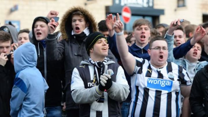 NEWCASTLE UPON TYNE, ENGLAND - FEBRUARY 01: Newcastle fans await the arrival of the travelling Sunderland fans, who will escorted into the stadium by police prior to kickoff during the Barclays Premier League match between Newcastle United and Sunderland at St James' Park on February 1, 2014 in Newcastle upon Tyne, England. (Photo by Michael Regan/Getty Images)