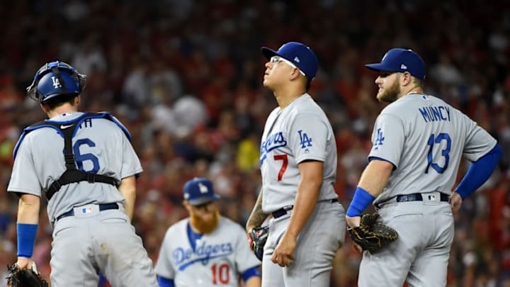 WASHINGTON, DC - OCTOBER 07: Julio Urias #7 of the Los Angeles Dodgers waits to be pulled in the fifth inning against the Washington Nationals in game four of the National League Division Series at Nationals Park on October 07, 2019 in Washington, DC. (Photo by Will Newton/Getty Images)