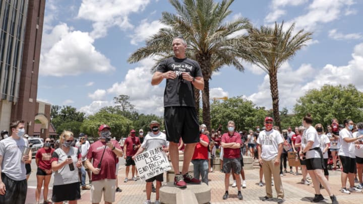 TALLAHASSEE, FL - JUNE 13: Head Coach Mike Norvell of the Florida State Football Team speaks with fans before a unity walk on June 13, 2020 in Tallahassee, Florida. Florida State players and members of the football coaching staff led fans and supporters on a unity walk from the Doak Campbell Stadium on the Florida State University campus to the state capitol building in support of the Black Lives Matter movement. Protests erupted across the nation after George Floyd died in police custody in Minneapolis, Minnesota on May 25th. (Photo by Don Juan Moore/Getty Images)