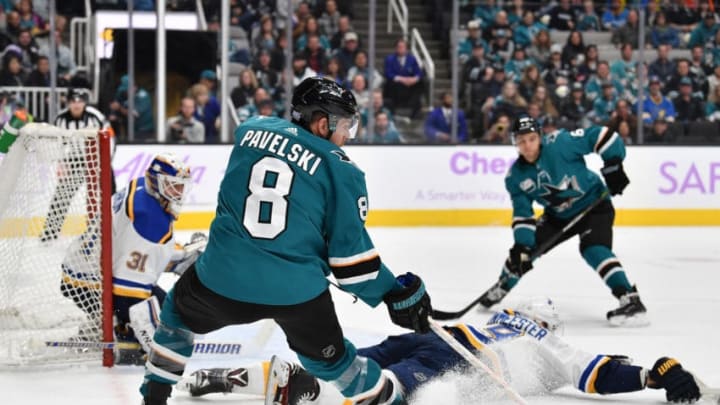 SAN JOSE, CA - NOVEMBER 17: Joe Pavelski #8 looks to make a pass to Kevin LaBanc #62 of the San Jose Sharks against the St Louis Blues at SAP Center on November 17, 2018 in San Jose, California (Photo by Brandon Magnus/NHLI via Getty Images)