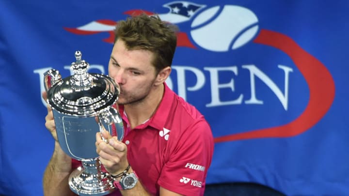 Stan Wawrinka of Switzerland kisses the championship trophy after defeating Novak Djokovic of Serbia in their 2016 US Open Men's Singles final match at the USTA Billie Jean King National Tennis Center in New York on September 11, 2016.Stan Wawrinka became the oldest US Open men's champion in 46 years when he defeated world number one Novak Djokovic to claim a third Grand Slam title on Sunday. / AFP / Timothy A. CLARY (Photo credit should read TIMOTHY A. CLARY/AFP/Getty Images)