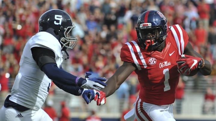 Nov 5, 2016; Oxford, MS, USA; Mississippi Rebels wide receiver A.J. Brown (1) carries the ball against Georgia Southern Eagles cornerback Darius Jones Jr. (5) during the first half at Vaught-Hemingway Stadium. Mandatory Credit: Justin Ford-USA TODAY Sports