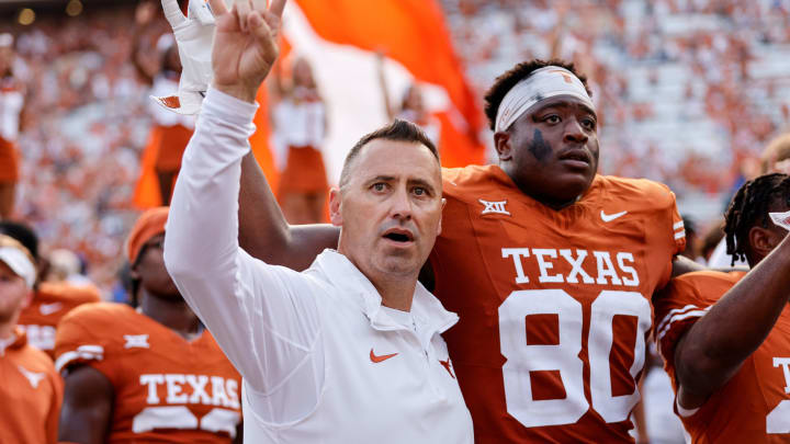 AUSTIN, TEXAS – OCTOBER 28: Head coach Steve Sarkisian of the Texas Longhorns celebrates with the team after the game against the Brigham Young Cougars at Darrell K Royal-Texas Memorial Stadium on October 28, 2023 in Austin, Texas. (Photo by Tim Warner/Getty Images)