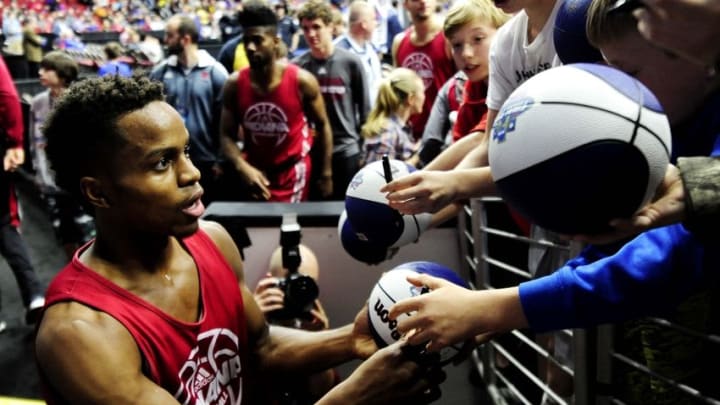 Mar 16, 2016; Des Moines, IA, USA; Indiana Hoosiers guard Yogi Ferrell (11) signs autographs during a practice day before the first round of the NCAA men