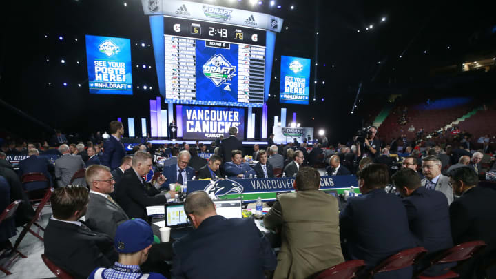 VANCOUVER, BRITISH COLUMBIA – JUNE 22: A general view of the Vancouver Canucks draft table is seen during Rounds 2-7 of the 2019 NHL Draft at Rogers Arena on June 22, 2019 in Vancouver, Canada. (Photo by Jeff Vinnick/NHLI via Getty Images)