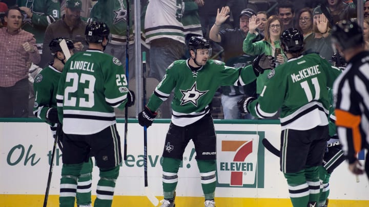 Feb 24, 2017; Dallas, TX, USA; Dallas Stars center Devin Shore (17) and defenseman Esa Lindell (23) and left wing Curtis McKenzie (11) celebrates a goal by Shore against the Arizona Coyotes during the first period at the American Airlines Center. Mandatory Credit: Jerome Miron-USA TODAY Sports