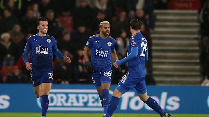 SOUTHAMPTON, ENGLAND – DECEMBER 13: Riyad Mahrez of Leicester City celebrates after scoring his sides first goal with Christian Fuchs of Leicester City and Ben Chilwell of Leicester City during the Premier League match between Southampton and Leicester City at St Mary’s Stadium on December 13, 2017 in Southampton, England. (Photo by Steve Bardens/Getty Images)