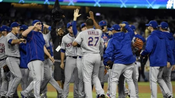 October 15, 2015; Los Angeles, CA, USA; New York Mets celebrate the 3-2 victory against Los Angeles Dodgers following game five of NLDS at Dodger Stadium. Mandatory Credit: Richard Mackson-USA TODAY Sports
