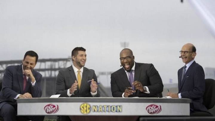 Oct 25, 2014; Lexington, KY, USA; Joe Tessitore and Tim Tebow and Marcus Spears and Paul Finebaum share a laugh during the SEC Nation pre game show before the game with the Mississippi State Bulldogs and the Kentucky Wildcats at Commonwealth Stadium. Mandatory Credit: Mark Zerof-USA TODAY Sports