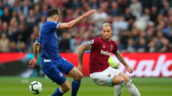 LONDON, ENGLAND - MARCH 30: Marko Arnautovic of West Ham United is challenged by Michael Keane of Everton during the Premier League match between West Ham United and Everton FC at London Stadium on March 30, 2019 in London, United Kingdom. (Photo by Catherine Ivill/Getty Images)