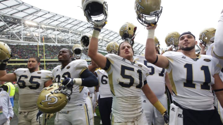 DUBLIN, IRELAND - SEPTEMBER 03: Trey Klock, Franics Kallon, Brant Mitchell and Matthew Jordan of Georgia Tech celebrate victory over Boston College during the Aer Lingus College Football Classic Ireland 2016 at Aviva Stadium on September 3, 2016 in Dublin, Ireland. (Photo by Patrick Bolger/Getty Images)