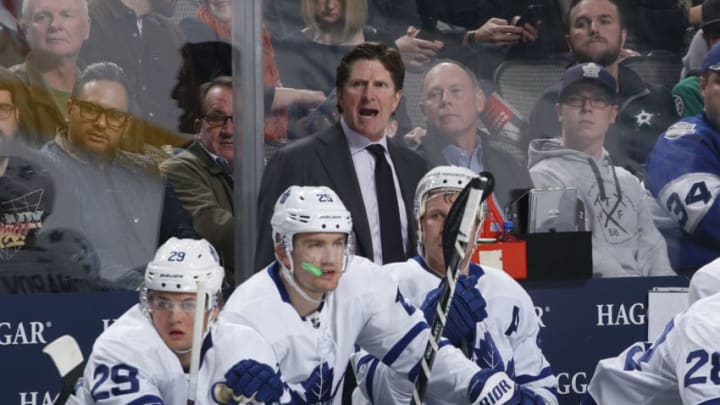 DALLAS, TX - JANUARY 25: Mike Babcock, head coach of the Toronto Maple Leafs watches the action from the bench against the Dallas Stars at the American Airlines Center on January 25, 2018 in Dallas, Texas. (Photo by Glenn James/NHLI via Getty Images)