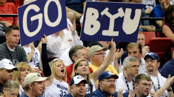 LAS VEGAS, NV - MARCH 10: Brigham Young University Cougars fans hold up signs during the team's game against the Texas Christian University Horned Frogs in a quarterfinal game of the Conoco Mountain West Conference Basketball tournament at the Thomas