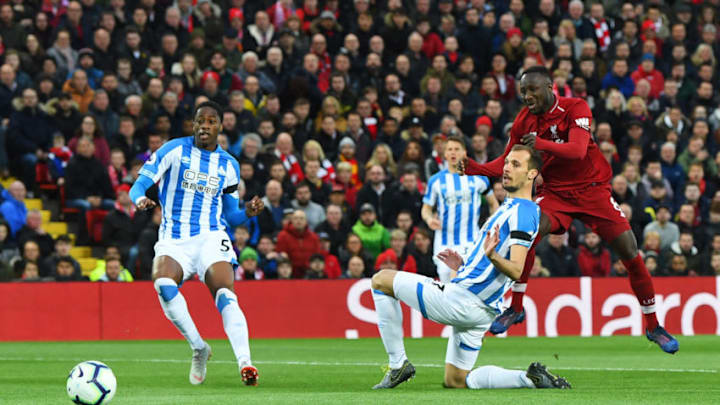LIVERPOOL, ENGLAND - APRIL 26: Naby Keita of Liverpool (8) scores his team's first goal during the Premier League match between Liverpool FC and Huddersfield Town at Anfield on April 26, 2019 in Liverpool, United Kingdom. (Photo by Michael Regan/Getty Images)