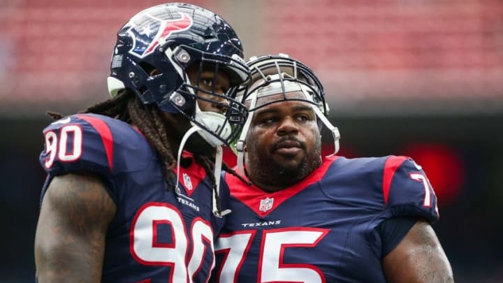 Sep 18, 2016; Houston, TX, USA; Houston Texans defensive end Jadeveon Clowney (90) talks with nose tackle Vince Wilfork (75) before a game against the Kansas City Chiefs at NRG Stadium. Mandatory Credit: Troy Taormina-USA TODAY Sports