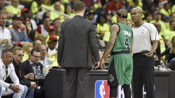 Apr 16, 2016; Atlanta, GA, USA; Boston Celtics guard Avery Bradley (0) lays on the court after an injury against the Atlanta Hawks during the second half in game one of the first round of the NBA Playoffs at Philips Arena. Mandatory Credit: John David Mercer-USA TODAY Sports