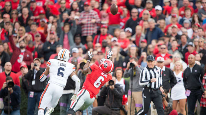 ATHENS, GA - NOVEMBER 12: Wide receiver Javon Wims #6 of the Georgia Bulldogs attempts to catch a pass in front of defensive back Carlton Davis #6 of the Auburn Tigers at Sanford Stadium on November 12, 2016 in Athens, Georgia. (Photo by Michael Chang/Getty Images)