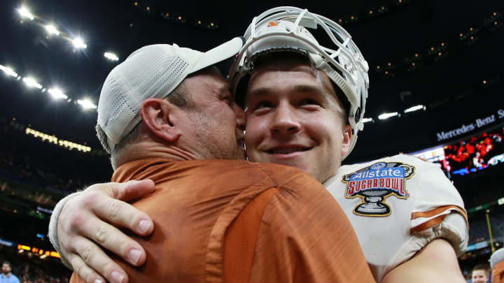 NEW ORLEANS, LOUISIANA – JANUARY 01: Head coach Tom Herman celebrates with Sam Ehlinger #11 of the Texas Longhorns after defeating Georgia Bulldogs 28-21 during the Allstate Sugar Bowl at Mercedes-Benz Superdome on January 01, 2019 in New Orleans, Louisiana. (Photo by Sean Gardner/Getty Images)