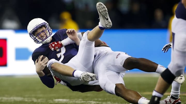 Nov 7, 2015; Seattle, WA, USA; Washington Huskies quarterback Jake Browning (3) gets sacked by Utah Utes linebacker Gionni Paul (13) during the third quarter at Husky Stadium. Utah won 34-23. Mandatory Credit: Jennifer Buchanan-USA TODAY Sports