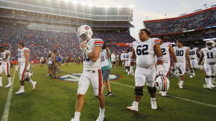 GAINESVILLE, FLORIDA - OCTOBER 05: Bo Nix #10 of the Auburn Tigers exits the field after a game against the Florida Gators at Ben Hill Griffin Stadium on October 05, 2019 in Gainesville, Florida. (Photo by James Gilbert/Getty Images)