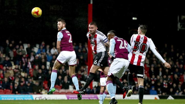 BRENTFORD, ENGLAND - JANUARY 31: Harlee Dean of Brentford heads at goal during the Sky Bet Championship match between Brentford and Aston Villa at Griffin Park on January 31, 2017 in Brentford, England. (Photo by Clive Rose/Getty Images)