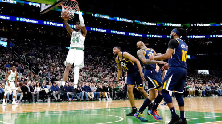 BOSTON, MASSACHUSETTS - MARCH 06: Robert Williams III #44 of the Boston Celtics dunks during the second quarter of the game against the Utah Jazz at TD Garden on March 06, 2020 in Boston, Massachusetts. NOTE TO USER: User expressly acknowledges and agrees that, by downloading and or using this photograph, User is consenting to the terms and conditions of the Getty Images License Agreement. (Photo by Omar Rawlings/Getty Images)