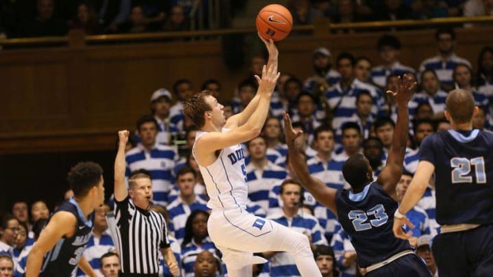 Dec 3, 2016; Durham, NC, USA; Duke Blue Devils guard Luke Kennard (5) shoots over Maine Black Bears guard Jaquan McKennon (23) in the first half of their game at Cameron Indoor Stadium. Mandatory Credit: Mark Dolejs-USA TODAY Sports