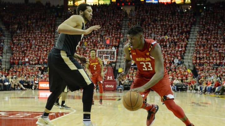 Feb 6, 2016; College Park, MD, USA; Maryland Terrapins center Diamond Stone (33) drives to the basket asPurdue Boilermakers center A.J. Hammons (20) defends during the second half at Xfinity Center. Maryland Terrapins defeated Purdue Boilermakers 72-61. Mandatory Credit: Tommy Gilligan-USA TODAY Sports