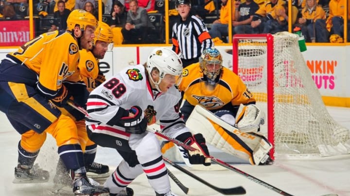 NASHVILLE, TN - APRIL 17: Mattias Ekholm #14 of the Nashville Predators chases Patrick Kane #88 of the Chicago Blackhawks during the second period in Game Three of the Western Conference First Round during the 2017 NHL Stanley Cup Playoffs at Bridgestone Arena on April 17, 2017 in Nashville, Tennessee. (Photo by Frederick Breedon/Getty Images)