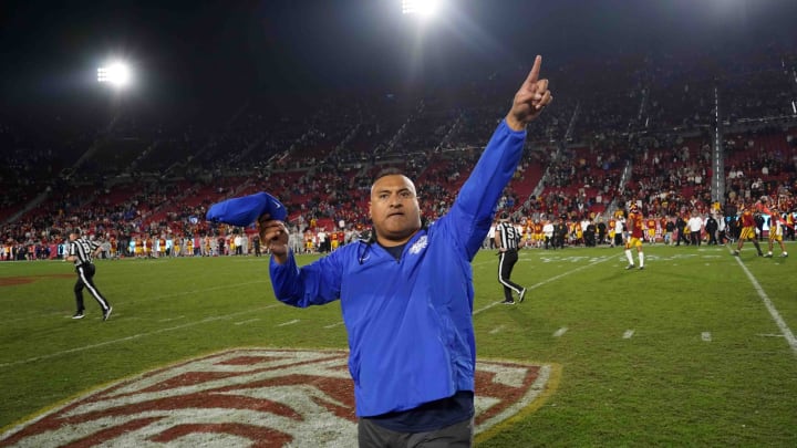 Nov 27, 2021; Los Angeles, California, USA; BYU Cougars head coach Kalani Sitake celebrates in the second half against the Southern California Trojans at United Airlines Field at Los Angeles Memorial Coliseum. Mandatory Credit: Kirby Lee-USA TODAY Sports