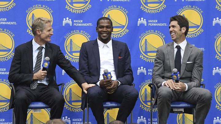 Jul 7, 2016; Oakland, CA, USA; Golden State Warriors head coach Steve Kerr (left), Kevin Durant (center), and general manager Bob Myers (right) address the media during a press conference after Durant signed with the Warriors at the Warriors Practice Facility. Mandatory Credit: Kyle Terada-USA TODAY Sports Jul 7, 2016; Oakland, CA, USA; Golden State Warriors head coach Steve Kerr (left), Kevin Durant (center), and general manager Bob Myers (right) address the media during a press conference after Durant signed with the Warriors at the Warriors Practice Facility. Mandatory Credit: Kyle Terada-USA TODAY Sports