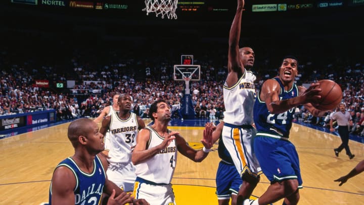 OAKLAND, CA – 1996: Jimmy Jackson #24 of the Dallas Mavericks shoots the ball against the Golden State Warriors circa 1996 at the Oakland-Alameda County Coliseum Arena in Oakland, California. NOTE TO USER: User expressly acknowledges and agrees that, by downloading and or using this photograph, User is consenting to the terms and conditions of the Getty Images License Agreement. Mandatory Copyright Notice: Copyright 1996 NBAE (Photo by Sam Forencich/NBAE via Getty Images)