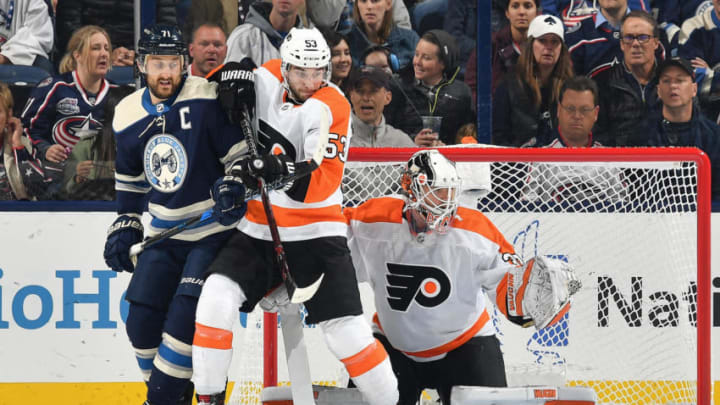 COLUMBUS, OH - OCTOBER 18: Nick Foligno #71 of the Columbus Blue Jackets battles for position with Shayne Gostisbehere #53 of the Philadelphia Flyers in front of goaltender Calvin Pickard #33 of the Philadelphia Flyers on October 18, 2018 at Nationwide Arena in Columbus, Ohio. (Photo by Jamie Sabau/NHLI via Getty Images)