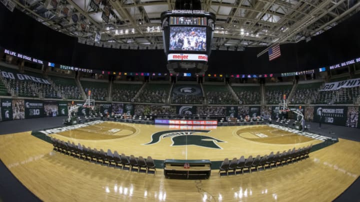 EAST LANSING, MI - DECEMBER 13: The signage and the fan cut outs in an empty stadium before the first half of a college basketball game between the Michigan State Spartans and the Oakland Golden Grizzlies at the Breslin Center on December 13, 2020 in East Lansing, Michigan. Michigan State defeated Oakland 109-91. (Photo by Dave Reginek/Getty Images)