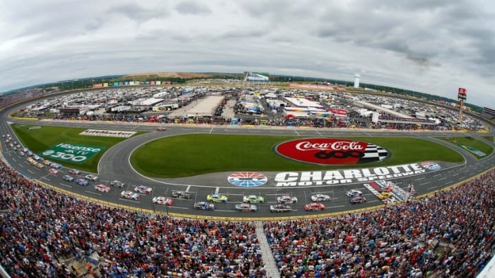 May 29, 2016; Concord, NC, USA; The field crosses the start-finish line to begin the Coca-Cola 600 at Charlotte Motor Speedway. Mandatory Credit: Jim Dedmon-USA TODAY Sports
