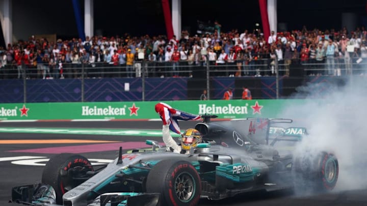 MEXICO CITY, MEXICO - OCTOBER 29: Lewis Hamilton of Great Britain and Mercedes GP celebrates after winning his fourth F1 World Drivers Championship after the Formula One Grand Prix of Mexico at Autodromo Hermanos Rodriguez on October 29, 2017 in Mexico City, Mexico. (Photo by Clive Mason/Getty Images)