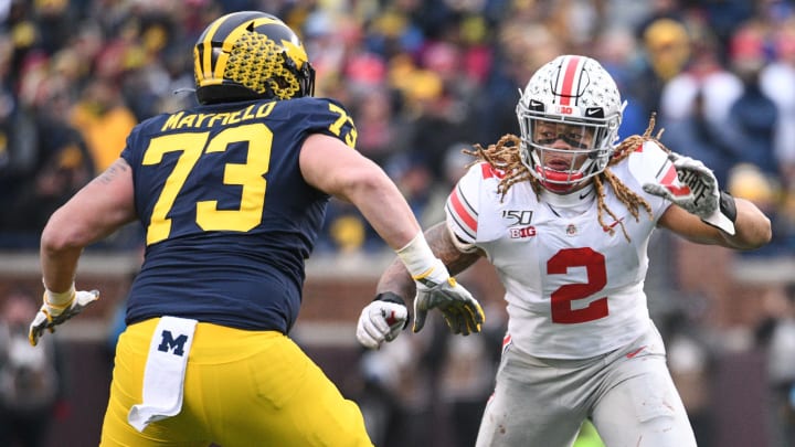 Nov 30, 2019; Ann Arbor, MI, USA; Ohio State Buckeyes defensive end Chase Young (2) battles for position with Michigan Wolverines offensive lineman Jalen Mayfield (73) during the game at Michigan Stadium. Mandatory Credit: Tim Fuller-USA TODAY Sports