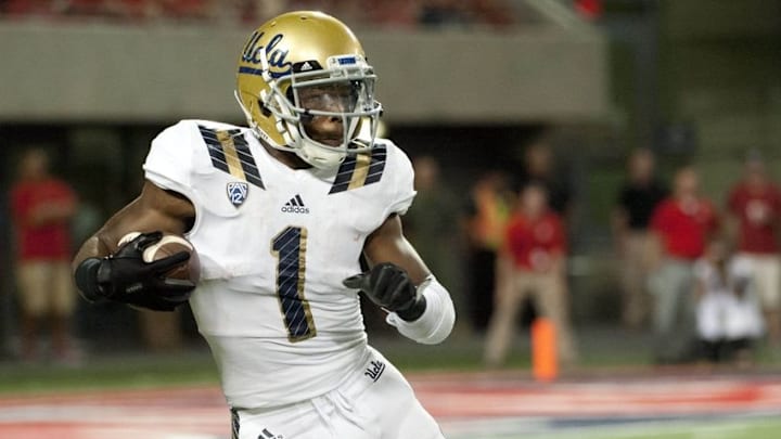 Sep 26, 2015; Tucson, AZ, USA; UCLA Bruins running back Soso Jamabo (1) runs the ball during the third quarter against the Arizona Wildcats at Arizona Stadium. UCLA won 56-30. Mandatory Credit: Casey Sapio-USA TODAY Sports Sep 26, 2015; Tucson, AZ, USA; UCLA Bruins running back Soso Jamabo (1) runs the ball during the third quarter against the Arizona Wildcats at Arizona Stadium. UCLA won 56-30. Mandatory Credit: Casey Sapio-USA TODAY Sports