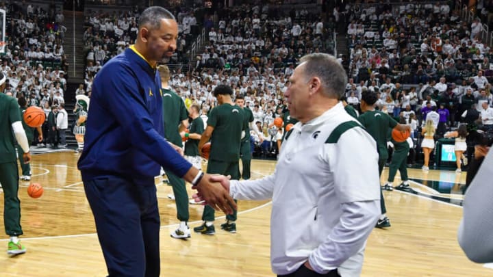 EAST LANSING, MICHIGAN - JANUARY 07: Head Basketball Coach Tom Izzo (R) of the Michigan State Spartans and Head Basketball Coach Juwan Howard (L) of the Michigan Wolverines shake hands before a college basketball game at Breslin Center on January 07, 2023 in East Lansing, Michigan. (Photo by Aaron J. Thornton/Getty Images)