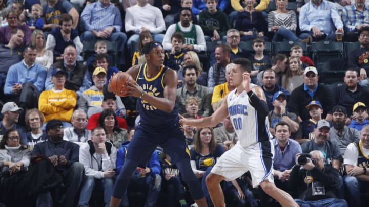 INDIANAPOLIS, IN - JANUARY 27: Myles Turner #33 of the Indiana Pacers looks to the basket against Aaron Gordon #00 of the Orlando Magic during a game at Bankers Life Fieldhouse on January 27, 2018 in Indianapolis, Indiana. The Pacers won 114-112. NOTE TO USER: User expressly acknowledges and agrees that, by downloading and or using the photograph, User is consenting to the terms and conditions of the Getty Images License Agreement. (Photo by Joe Robbins/Getty Images)
