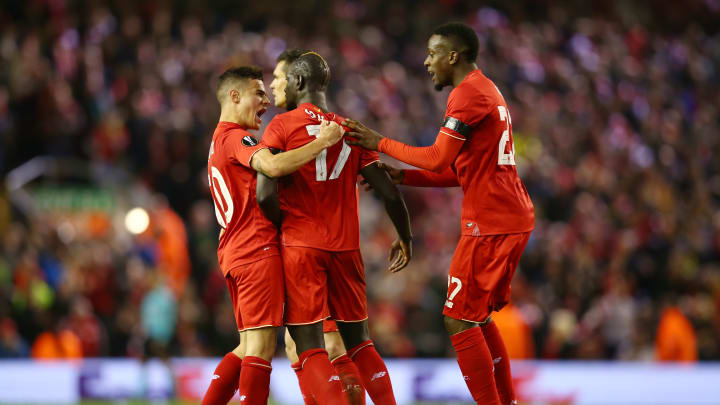 LIVERPOOL, ENGLAND – APRIL 14: Mamadou Sakho (C) of Liverpool celebrates scoring his team’s third goal with Philippe Coutinho (L) during the UEFA Europa League quarter final, second leg match between Liverpool and Borussia Dortmund at Anfield on April 14, 2016 in Liverpool, United Kingdom. (Photo by Clive Brunskill/Getty Images)