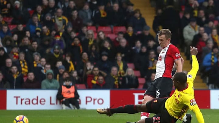 WATFORD, ENGLAND - JANUARY 13: James Ward-Prowse of Southampton scores his sides second goal as Christian Kabasele of Watford attempts to block during the Premier League match between Watford and Southampton at Vicarage Road on January 13, 2018 in Watford, England. (Photo by Christopher Lee/Getty Images)