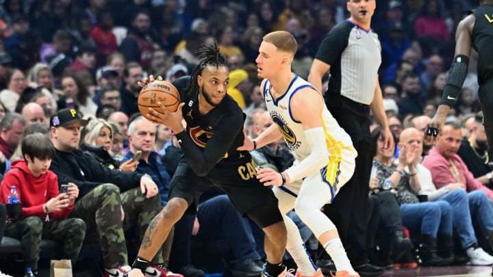 Donte DiVincenzo guards Darius Garland during a matchup between the Cleveland Cavaliers and Golden State Warriors on January 20. (Photo by Jason Miller/Getty Images)