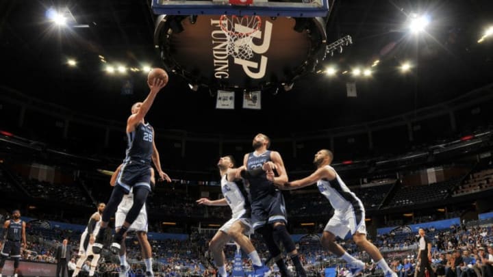 ORLANDO, FL - OCTOBER 10: Chandler Parsons #25 of the Memphis Grizzlies shoots the ball against the Orlando Magic during a pre-season game on October 10, 2018 at Amway Center in Orlando, Florida. NOTE TO USER: User expressly acknowledges and agrees that, by downloading and or using this photograph, User is consenting to the terms and conditions of the Getty Images License Agreement. Mandatory Copyright Notice: Copyright 2018 NBAE (Photo by Fernando Medina/NBAE via Getty Images)